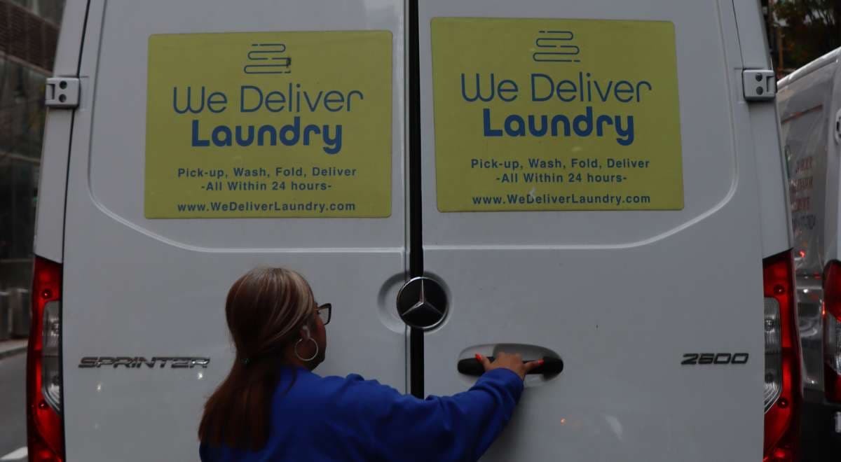 We Deliver Laundry van delivering clean laundry in New York City